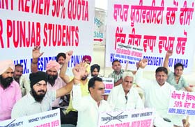 Activists protest against scrapping of 50 per cent quota for Punjab students by Thapar University in Patiala