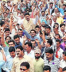 Nurpur MLA Rakesh Pathania with his supporters at Dharamsala on Friday. 