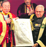 Jamia Millia Islamia University Chancellor MA Zaki (R) confers an honorary degree of Doctor of Letters on United Nations Secretary General Ban Ki-moon in New Delhi on Friday.