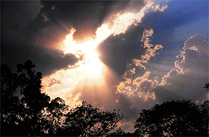 The sun shines through clouds before rains in Chandigarh on Saturday