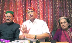 Senior Congress leader Vilas Muttemwar addresses mediapersons at the party office in Shimla on Saturday