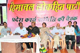 Himachal Lokhit Party president Maheshwar Singh addresses mediapersons in Mandi on Saturday