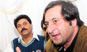 Peoples Conference chairman Sajjad Lone addresses mediapersons in Srinagar on Saturday.