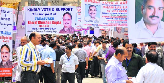 Members of the Jammu Chamber of Commerce and Industry outside the Chamber House to cast their votes