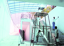 Workers give final touches to the pedestrian underpass outside the Mini- Secretariat in Ludhiana on Friday. 