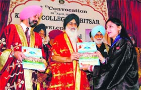 Punjab Chief Minister Parkash Singh Badal distributes degrees at the convocation of Khalsa College in Amritsar on Sunday