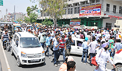 Students outside the Mata Sita Ji Degree College which was declared as one of the examination centres only two days back