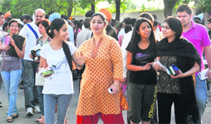 Students come out from a school after taking the All India Engineering (Architecture) entrance examination in Chandigarh on Sunday. 