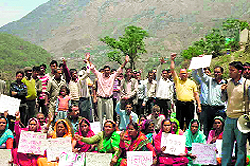 Peepalkoti villagers block traffic in protest against the closure of the hydro-electric projects in their area on Sunday
