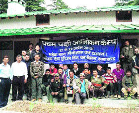 A group of bird watchers at Mahesh Khan in the Nainital forest division.