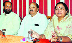 Founders of the Hans Foundation Bholeji Maharaj (centre) and Mata Mangla Devi talk about their social projects being carried out in 22 states, in Haridwar on Sunday. 