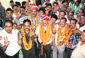 Newly elected members of the Jammu Chamber of Commerce and Industry on Sunday.