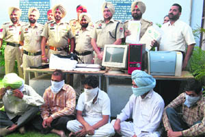 The police shows fake certificates recovered from the five accused in Ludhiana on Sunday.  