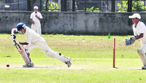A batsman plays a shot during the Punjab State Inter-District Cricket Tournament (U-16) for the ML Markan Trophy  at the PAU in Ludhiana on Sunday. 