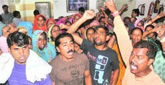 Members of the sweepers union protest outside the venue of the General House of the municipal corporatiom in Chandigarh