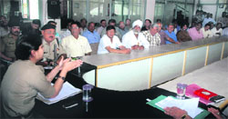 SSP Neeru Garg addresses a meeting of wedding hall owners and hoteliers in Dehradun