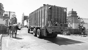 The gate opens to limitless possibilities: An Indian truck heads for Pakistan.