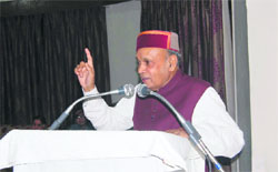 Chief Minister PK Dhumal addresses a function organised by mediapersons at Hamirpur on Sunday.