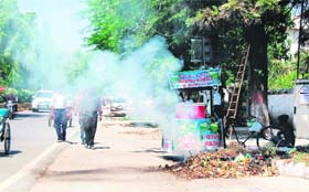 Garbage set afire near the Mall road in Amritsar on Tuesday