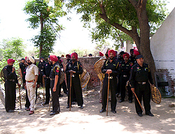 Security guards outside the gurudwara at Rampura