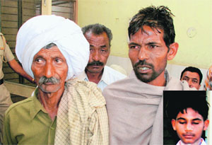 Somnath (grandfather) and Baljit (father) of Bunty (inset) who died in the Lalru factory blast on Monday.