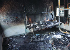 The burnt interior of a coach at Old Delhi Railway Station.