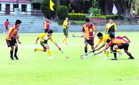 A match in progress in the 8th S Kandhari Memorial Hockey Tournament in Dehradun on Tuesday