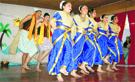 Students perform folk dance during a cultural function at SPS School in Shimla.