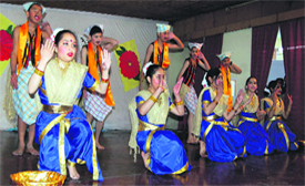 Students perform folk dance during a cultural function at SPS School in Shimla.