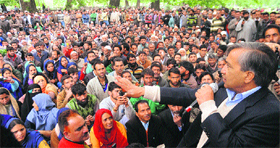 CPM state secretary Mohammad Yousuf Tarigami addresses daily wagers, workers and labourers at Sher-e-Kashmir Park in Srinagar on Tuesday.