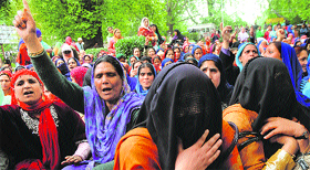 Women hold a protest in support of their demands in Srinagar on Tuesday