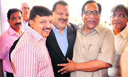 Davinder Singh Rana, political adviser to the Chief Minister, greets the re-elected president and new members of the JCCI in Jammu
