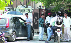 Even on a government holiday, visitors had to pay for parking at the tehsil complex in Jalandhar
