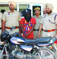 Rajvir Singh in police custody in Jalandhar
