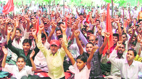 Workers of the Karkhana Mazdoor Union observe May Day in Ludhiana on Tuesday.