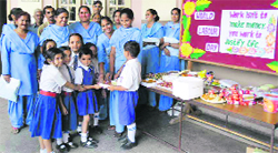 Students celebrate Labour Day at GMT Public School in Ludhiana on Tuesday.