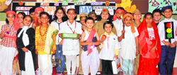 Students of Green Land Convent School dressed in colourful costumes for a freshers party in Ludhiana on Tuesda.