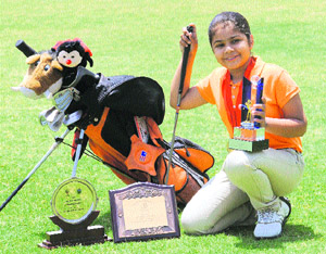 Vasundhara Thiara with her trophies at the Chandigarh Golf Range. 