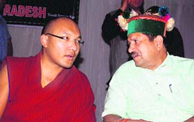 The 17th Karmapa, Ogyen Trinley Dorjee, and Indresh Kumar, president of the Himalayan Parivar, HP, at a programme in Dharamsala on Wednesday