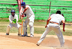 A batsman plays a shot during a match at MA Stadium in Jammu on Wednesday