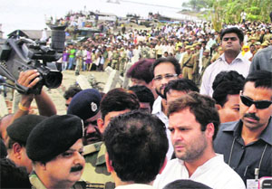 AICC general secretary Rahul Gandhi interacts with relatives of victims of the boat tragedy in Dhubri, Assam, on Wednesday. 