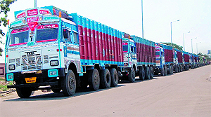Trucks line up at the Integrated Check Post at the Attari border before crossing over to Pakistan on Wednesday