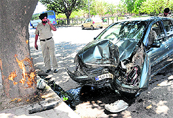 A car that was damaged after it rammed into a tree at Industrial Area Phase I near railway bridge in Chandigarh on Thursday