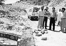 Mohali DC Varun Roojam (third from left) reviews the construction of the link road at Masol on Thursday