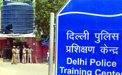 The Delhi Police Training Center at Malviya Nagar where the body of the constable was found inside a water tank (inset)