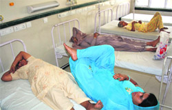 Patients wait for their turn in a corridor of the Civil Hospital, Rohtak