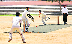 A batsman plays a shot during a match in the Ashok Sodhi Memorial Cricket Tournament at Parade Ground in Jammu on Thursday.