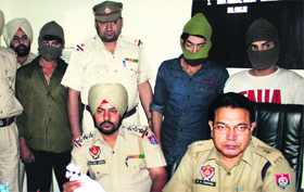 The accused in police custody in Jalandhar on Thursday. 