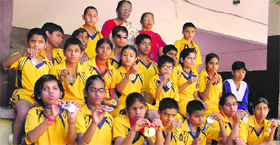 Students of the Vocational Rehabilitation Training Centre for Blind/Disabled pose with their medals that they won during a sports competition organised by the Punjab Sports Association for Blind recently.
