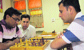 Participants mull their moves in the LIC Chess Meet in Ludhiana.